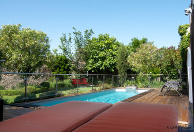 Private heated swimming pool with safety features